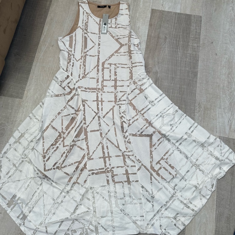APT 9 sleveless flair dress . New with tags , white with beige lining.